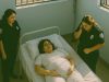 Woman gives birth in prison hospital room: midwife approaches her to examine her, then screams in horror